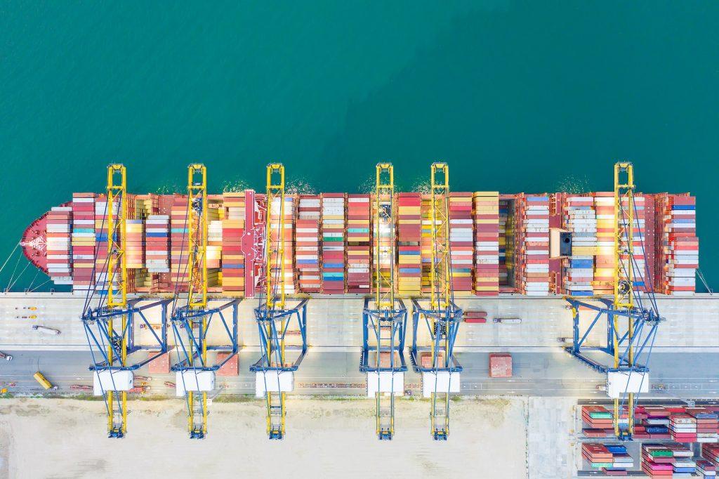 Container ships at industrial ports in the business of import, export