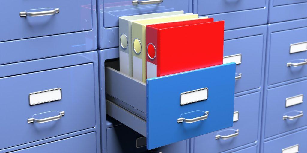 Office document binders in a filing cabinet drawer. 3d illustration